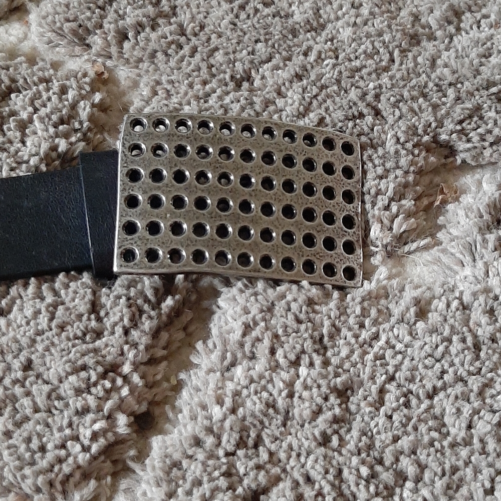 Black leather belt with silver buckle